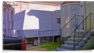 FEMA trailers parked on lots of Katrina destroyed homes are a common site a year or more after the hurricane 380x214