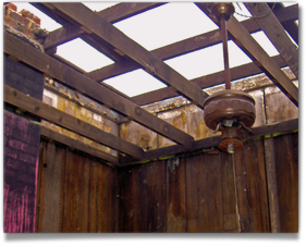 Many New Orleans homes are gutted, with exposed celing slats 281x225