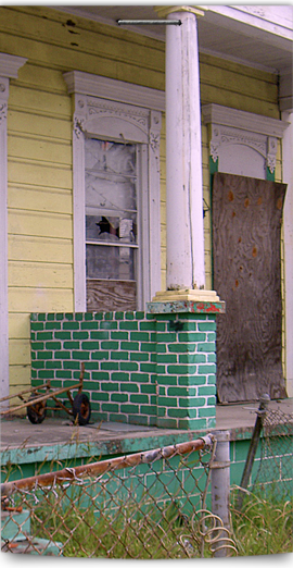 Homes are still boarded up on empty streets in Upper 9th Ward West 270x522