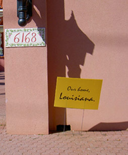 A sign in front of a Lakeview home rebuilt after Katrina reads Our Home, Louisiana 254x306